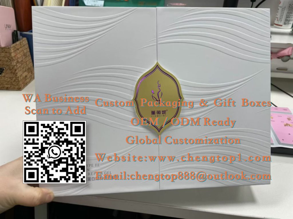 White Dual-Door Skincare Gift Boxes: Embossed Wave Cases with Gold Shield Embl...